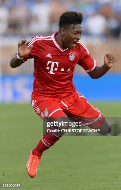 German Bundesliga first division football club FC Bayern Munich's Austrian midfielder David Alaba falls during a test match between FC Bayern Munich...