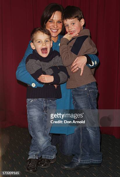 Hugo, Natarsha and Harrison Belling pose during the Disney On Ice "Princesses & Heroes" opening show VIP party at Allphones Arena on July 10, 2013 in...
