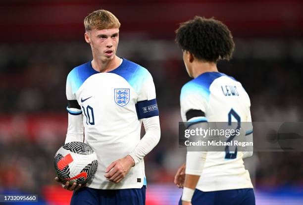 Cole Palmer of England speaks with Rico Lewis during the UEFA U21 EURO Qualifier match between England and Serbia at City Ground on October 12, 2023...