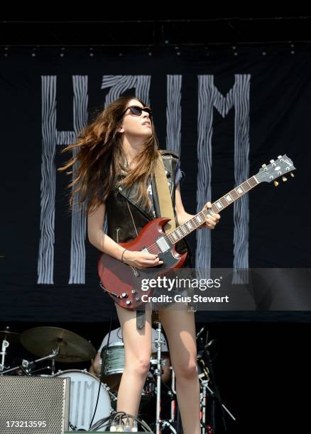 Danielle Haim of Haim performs on stage at The Summer Stampede at Queen Elizabeth Olympic Park on July 6, 2013 in London, England.