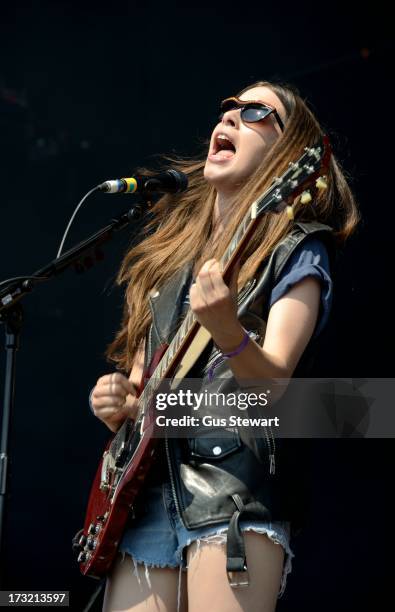 Danielle Haim of Haim performs on stage at The Summer Stampede at Queen Elizabeth Olympic Park on July 6, 2013 in London, England.