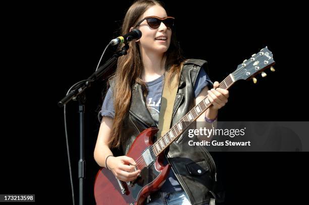 Danielle Haim of Haim performs on stage at The Summer Stampede at Queen Elizabeth Olympic Park on July 6, 2013 in London, England.