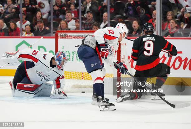 Josh Norris of the Ottawa Senators scores a first period goal against Darcy Kuemper of the Washington Capitals at Canadian Tire Centre on October 18,...