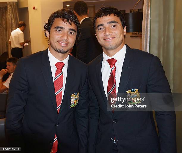 Fabio da Silva and Rafael da Silva of Manchester United check in at Manchester Airport ahead of their pre-season tour to Bangkok, Australia, Japan,...