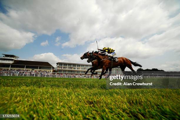 Shane Kelly riding Matraash win The BHEST Racing To Schools Selling Stakes from Hilden at Lingfield racecourse on July 10, 2013 in Lingfield, England.