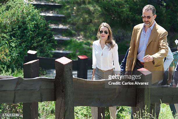 Prince Felipe of Spain and Princess Letizia of Spain visit the new National Park of Sierra de Guadarrama on July 10, 2013 in Rascafria, near of...