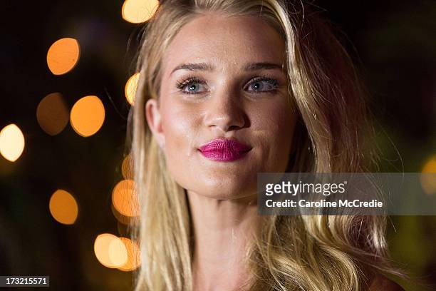 Model Rosie Huntington-Whiteley arrives at a black tie dinner hosted by ModelCo on Hayman Island in celebration of their new celebrity ambassador...