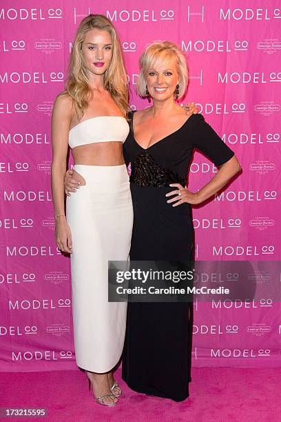 Model Rosie Huntington-Whiteley and Company Founder Shelley Barrett arrive at a black tie dinner hosted by ModelCo on Hayman Island in celebration of...