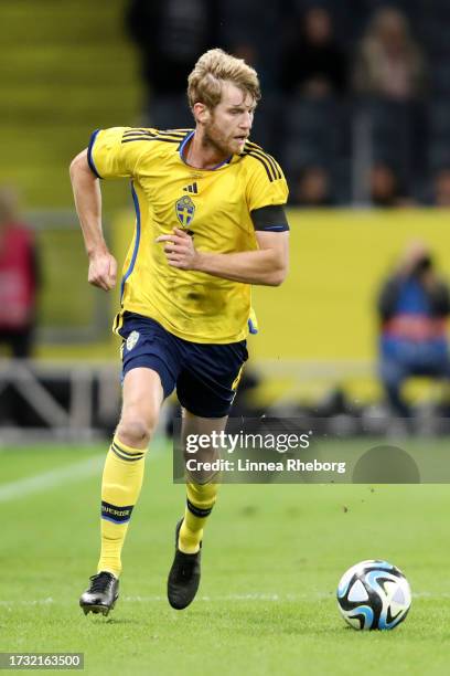 Filip Helander of Sweden runs with the ball during the international friendly match between Sweden and Moldova at Friends Arena on October 12, 2023...