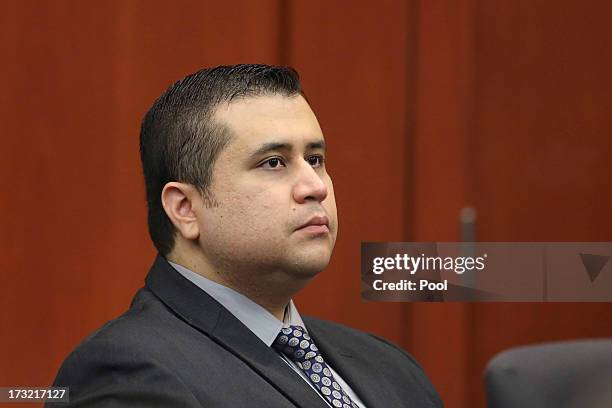 Defendant George Zimmerman sits in Semimole circuit court during his murder trial July 10, 2013 in Sanford, Florida. Zimmerman has been charged with...