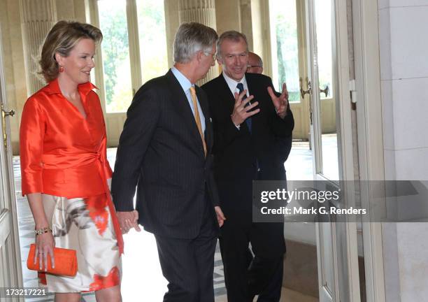 Prince Philippe and Princess Mathilde of Belgium and former Prime Minister of Belgium Yves Leterme meet at Laeken Castle on July 10, 2013 in...