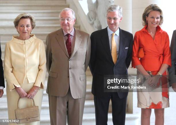 Queen Paola, King Albert, Prince Philippe and Princess Mathilde of Belgium meet former Prime Ministers of Belgium at Laeken Castle on July 10, 2013...