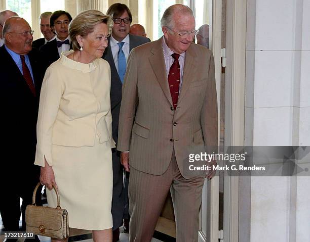 King Albert II and Queen Paola of Belgium meet with former Belgian Prime Ministers at Laeken Castle on July 10, 2013 in Brussels, Belgium.