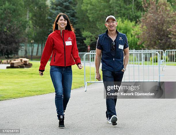 Jeff Bezos, founder and CEO Amazon.com, and his wife Mackenzie Bezos arrive for morning session of the Allen & Co. Annual conference at the Sun...