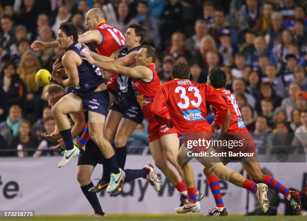 Brendan Fevola of Victoria attempts to take a mark during the EJ Whitten Legends AFL game between Victoria and the All Stars at Etihad Stadium on...