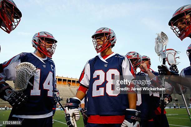 Members of the Boston Cannons including Brent Adams and Ryan Boyle huddle up prior to their game against the Charlotte Hounds on July 6, 2013 at...