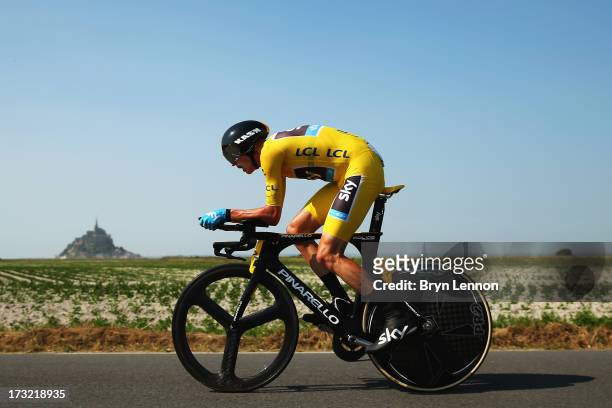 Chris Froome of Great Britain and Team Sky Procycling rides during stage eleven of the 2013 Tour de France, a 33KM Individual Time Trial from...