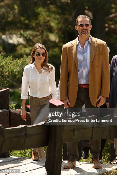 Prince Felipe of Spain and Princess Letizia of Spain visit Guadarrama National Park on July 10, 2013 in Rascafria, Spain.