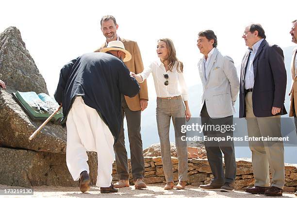 Prince Felipe of Spain and Princess Letizia of Spain visit Guadarrama National Park on July 10, 2013 in Rascafria, Spain.