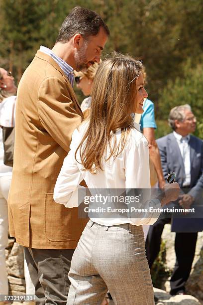 Prince Felipe of Spain and Princess Letizia of Spain visit Guadarrama National Park on July 10, 2013 in Rascafria, Spain.