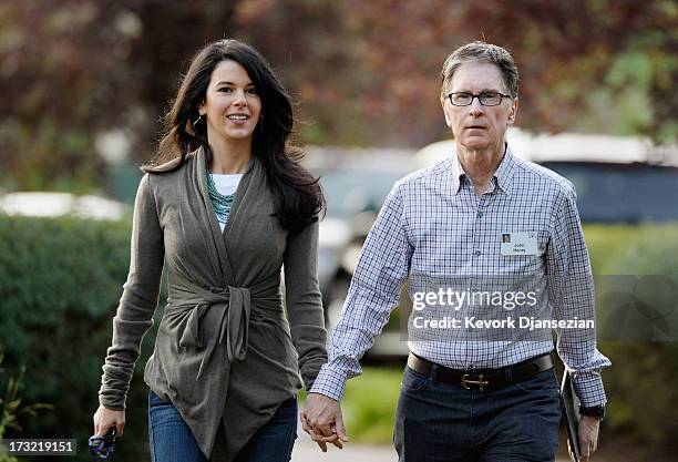 John W. Henry, owner of Boston Red Sox, and his wife Linda Pizzuti arrive for the Allen & Co. Annual conference at the Sun Valley Resort on July 10,...