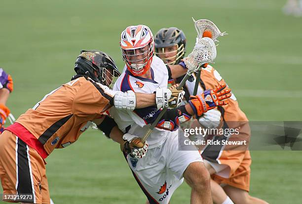 Garrett Thul of the Hamilton Nationals plays against Steve DeNapoli of the Rochester Rattlers at Sahlen's Stadium on July 7, 2013 in Rochester...