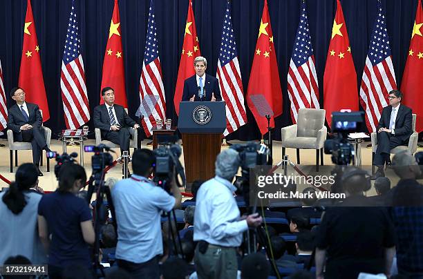 Secretary of State John Kerry speaks while Chinese State Councilor Yang Jiechi , Chinese Vice Premier Wang Qishan , and U.S. Secretary of the...