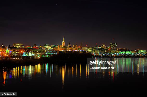 ottawa skyline view from interprovincial bridge - ottawa night stock pictures, royalty-free photos & images