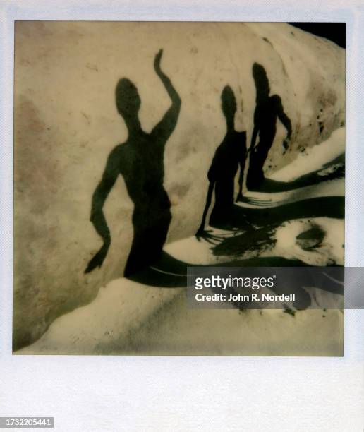 Polaroid photo of shadows walking along a wall in California, circa 1978.
