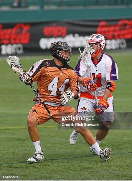 Dave Lawson of the Rochester Rattlers plays against Roman Lao-Gosney of the Hamilton Nationals at Sahlen's Stadium on July 7, 2013 in Rochester...