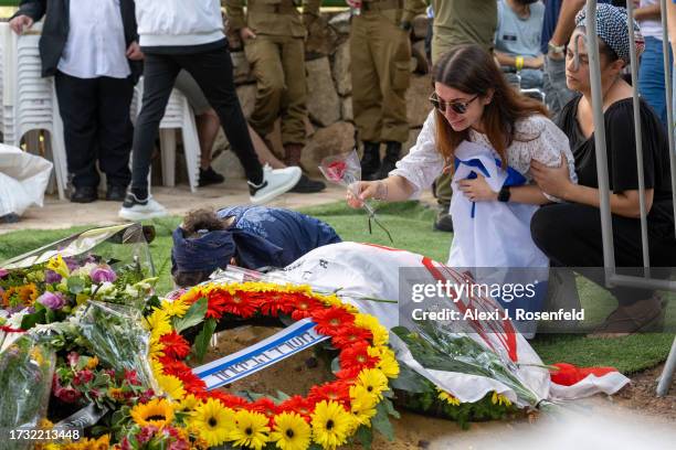 The sister of Valentin Ghnassia originally from France, who was killed in a battle with Palestinian militants at Kibbutz Be’eeri near the Israeli...