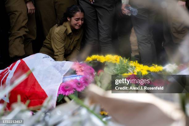 Family and friends of Valentin Ghnassia who was killed in a battle with Palestinian militants at Kibbutz Be’eeri near the Israeli border with the...