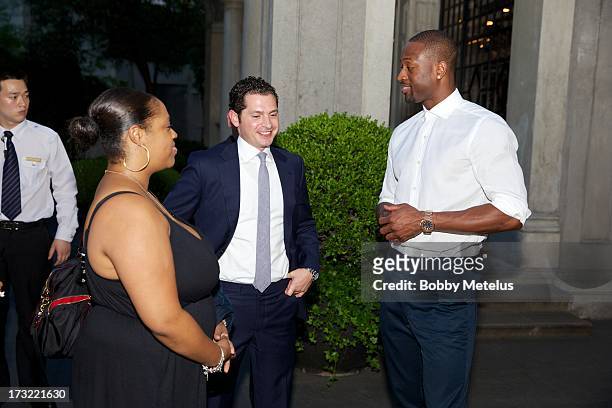 Dwyane Wade with Wade brand business manager Lisa Metelus and Director of Hotel Operations Michael Talansky talk during the SLS Hotels China Branding...