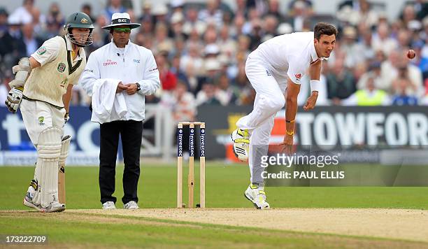 England's Steven Finn bowls on the first day of the first test of the 2013 Ashes series between England and Australia at Trent Bridge in Nottingham,...