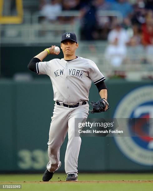 Luis Cruz of the New York Yankees makes a play at shortstop during the game against the Minnesota Twins on July 3, 2013 at Target Field in...