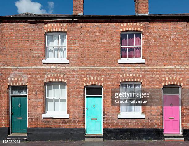 terraced houses - british culture stock pictures, royalty-free photos & images
