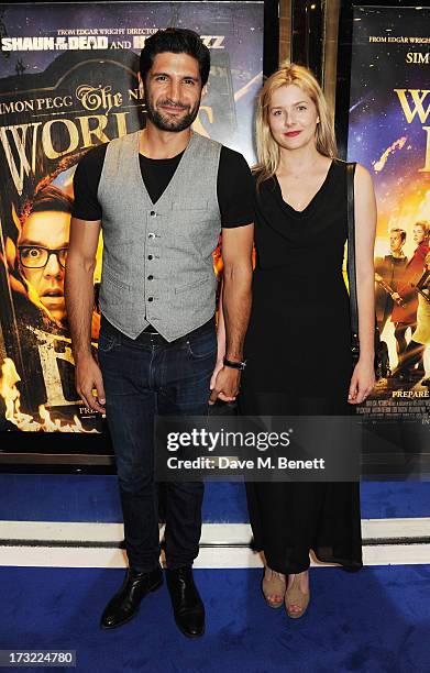 Kayvan Novak and Rachel Hurd-Wood attends the World Premiere of 'The World's End' at Empire Leicester Square on July 10, 2013 in London, England.