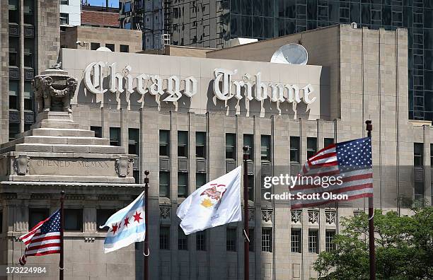 Flags fly along the Michigan Avenue bridge near the Tribune Tower, home of the Chicago Tribune, WGN Radio and the Tribune Company, on July 10, 2013...