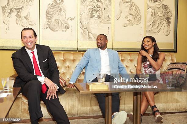 Dwyane Wade and Gabrielle Union talk with SBE Group president Sam Bakhshandehpour at the SLS Hotels China Brand launch at the Key Club on July 10,...