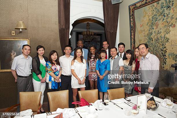 Dwyane Wade, Gabrielle Union and SBE Group president Sam Bakhshandehpour pose with VIP guests at the SLS Hotels China Brand Launch at the Key Club on...