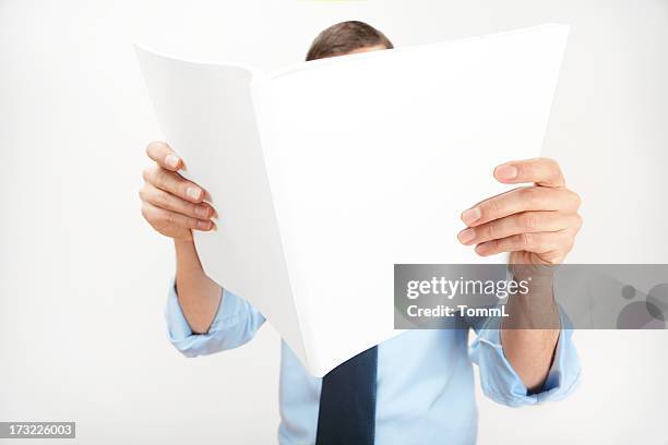 reading a mag - blank newspaper stock pictures, royalty-free photos & images