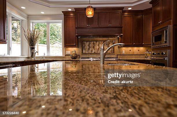 close up shot of granite kitchen counter - granite stock pictures, royalty-free photos & images