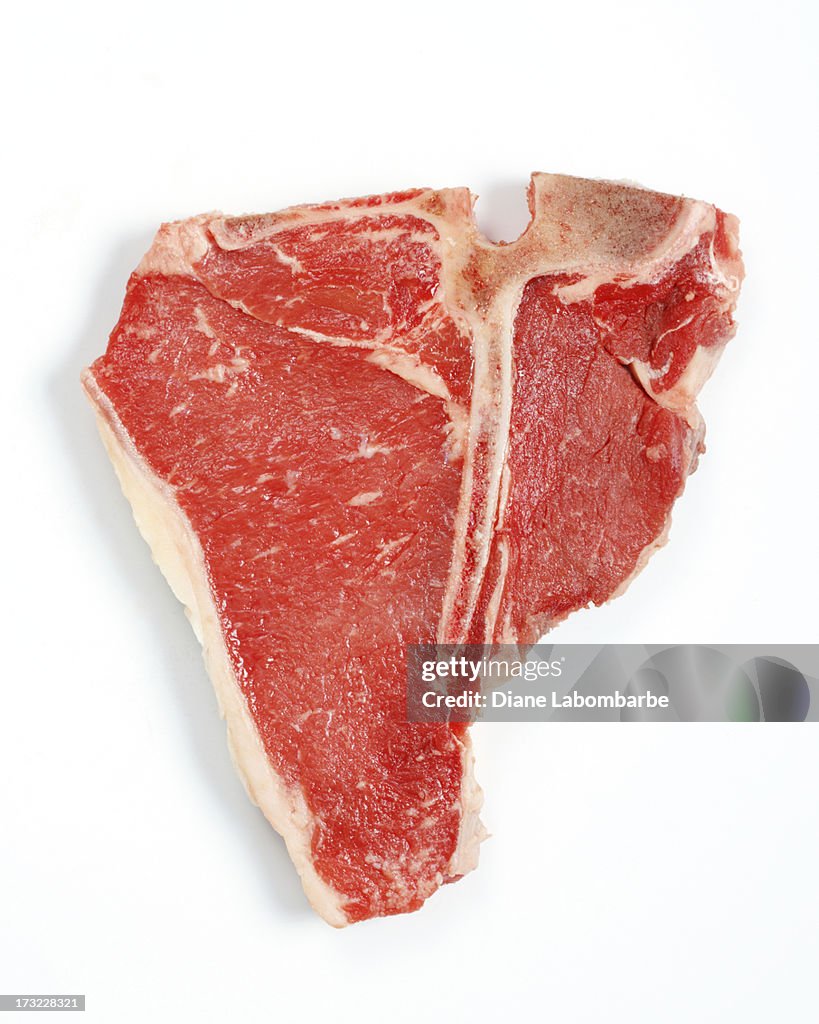 Raw T-Bone Steak Isolated On White