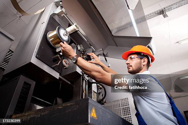 young foreman - operating machine stock pictures, royalty-free photos & images