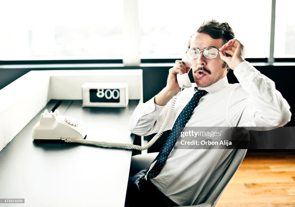 Businessman Sitting on Office