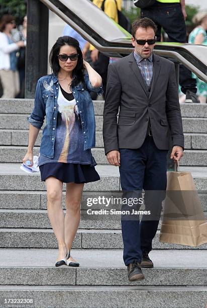 Lucy Liu and Jonny Lee Miller sighting on set filming Elementary on July 10, 2013 in London, England.