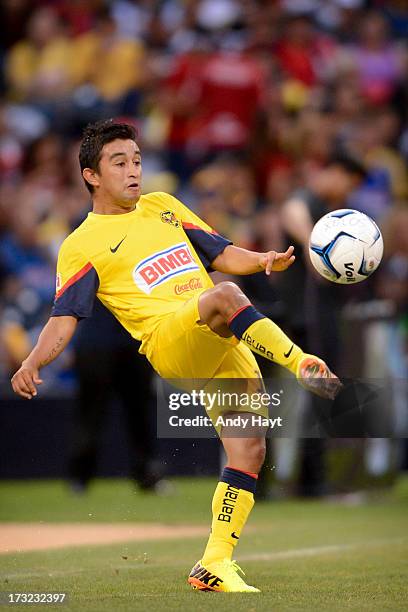Christian Bermudez of Club America kicks the ball in the game against the Tijuana Xolos in a LIGA MX Soccer match at Petco Park on July 6, 2013 in...