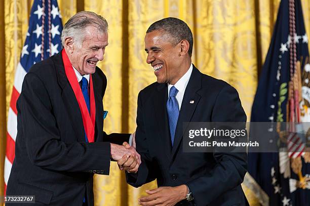 President Barack Obama presents a 2012 National Humanities Medal to National Humanities Medal to writer Frank Deford during a ceremony in the East...