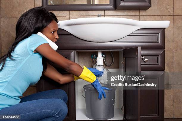 drain sink pipe blockage. - flooded home stockfoto's en -beelden