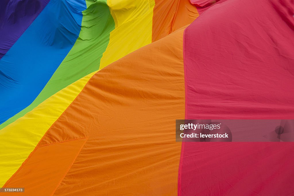 Rainbow Gay Pride Flag waves.